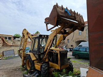 CATERPILLAR 428B 4X4 - 2