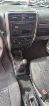 Suzuki Jimny 1,3i 62,5kw 69.500km - 2