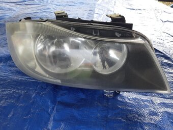 BMW E90 predFL svetlomet pravy - 2