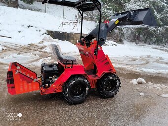 Kolesovy nakladac smykovy - 2