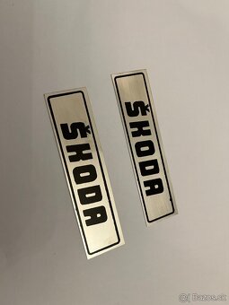 Ozdobné lišty na přední dveře.Škoda. - 2