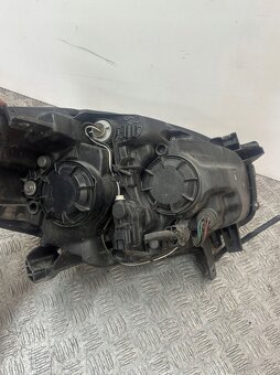 Renault Koleos I lift 2011- ľavé svetlo - 2