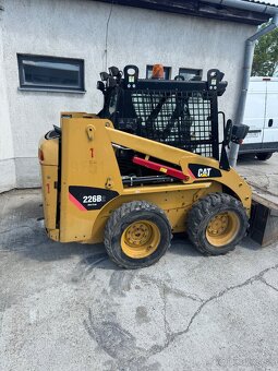 Caterpillar 226B2 so základnou lopatou.Výmením za nosič kont - 2