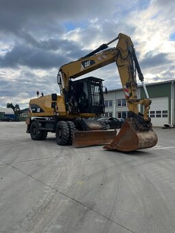 Kolesový bager/rýpadlo  Caterpillar M316D - 2