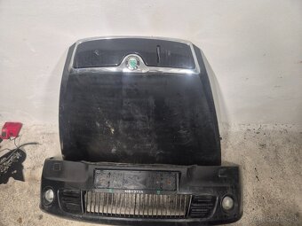 Predám náhradné diely na Škoda Octavia II 2 - ČIERNA VRS - - 2