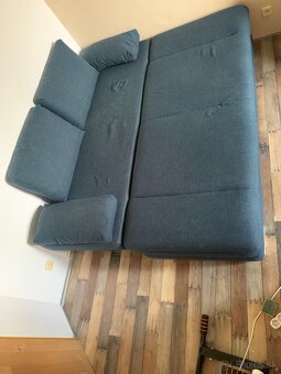 Modrá rozkladacia pohovka s úložným priestorom - 2