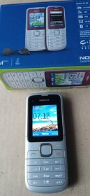 Nokia   225  ,  Nokia  C1  -  01 - 2