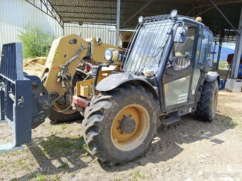 Caterpillar TH406 - 2