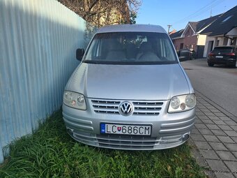 Vw caddy 1.9 77kw 4x4 7 miestna - 2