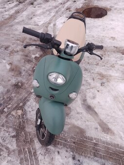 Unu elektroskuter - 2