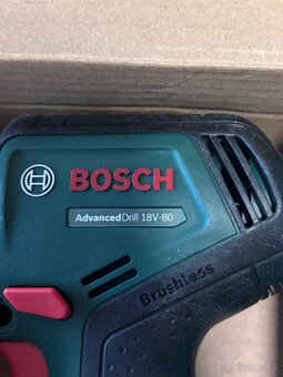 Vrtaci skrutkovač Bosch + nastavce - 2