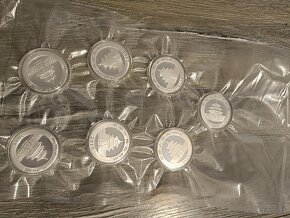 7 strieborných mincí 1 oz China Panda 2008 - 2017 - 2