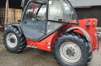 Teleskopický nakladač Manitou - 2