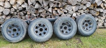 Disky s pneumatikami na Opel Frontera B - 2 sady - 2