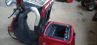 Elektrická trojkolka. - 2