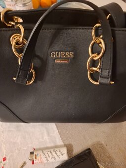 GUESS  / TOM YAILOR - 2