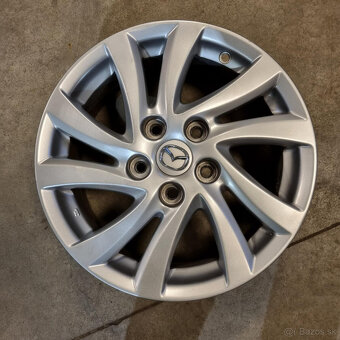 Mazda disky 5x114,3 R16 6,5J ET52.5 - 2