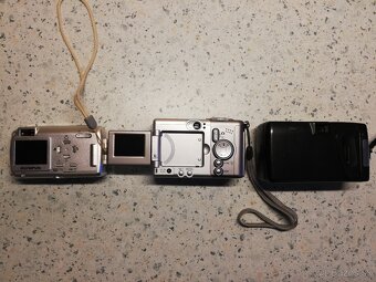 fotoaparáty Canon a Olympus - 2