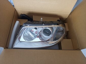 Predám predné svetlá Vw Passat B5,5 2001 - - 2