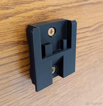 Nástenný držiak pre akumulátorové náradie Metabo CAS 18V - 2