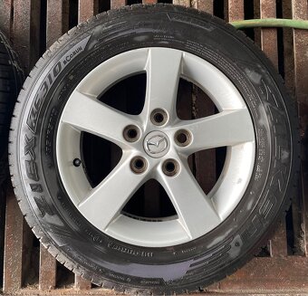5x114,3 R15 6J ET52,5 Mazda + 195/65 R15 Falken - 2