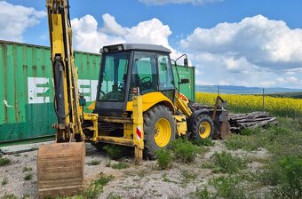 NEW HOLLAND LB110B traktorbager - 2