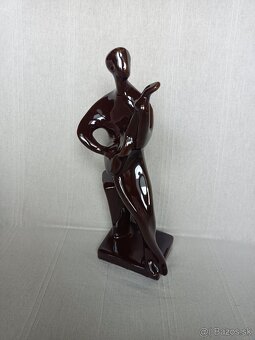 Porcelánová soška gitarista brusel - 2