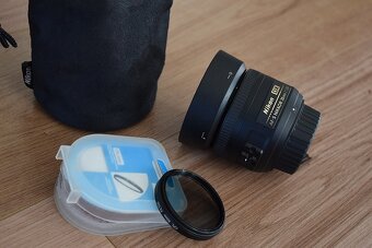 Nikkor 35 mm AF-s 1,8G nikon - clona krytky vrecko + filter - 2