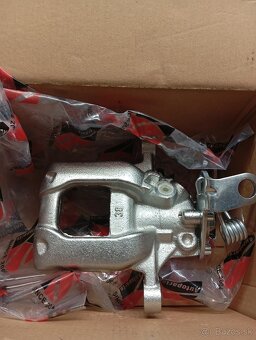 Predám nový zadný brzdový strmeň Škoda/Golf,viď fotto - 2