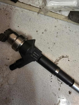 Vstrekovač Denso 55567729 - 2