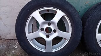 Predám alu disky s pneu 185/65 R14 - 2