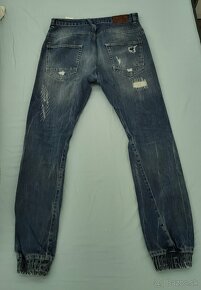 Kvalitné modré roztrhané rifle značky VSCT - 2