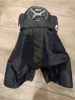 CCM hokejové nohavice junior - 2