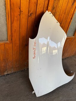 Fiat Doblo II 2010- pravý blatník - 2