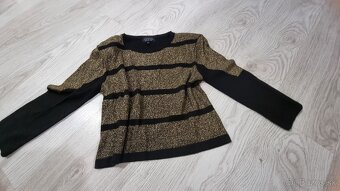 Zlatocierny top - 2