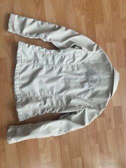 Dámska softshelová bunda. - 2