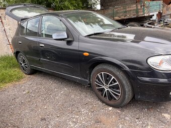 predam Nissan Almera - 2