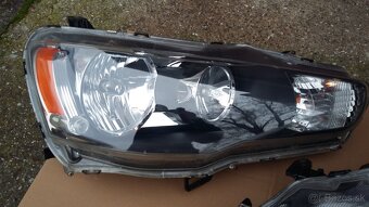 Predne svetla Lancer - 2