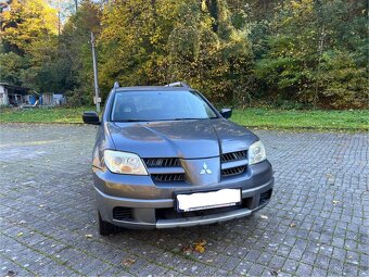 Mitsubishi Outlander 1 2.0 benzín 4x4 2006 - 2