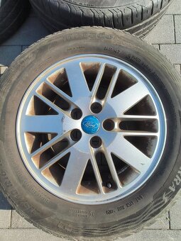 Hliníkové disky + pneu. na Ford, 215/60 R16 - 2