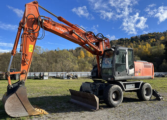 Kolesový báger Hitachi ZX210 - 2