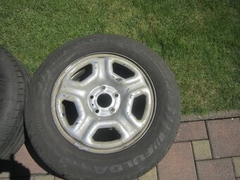 16" pl. disky Duster s let. pneu 215/65R16 98V Fulda - 2