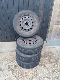 Plechové disky 4x110 R14, letné Barum 185/65 R15 - 2
