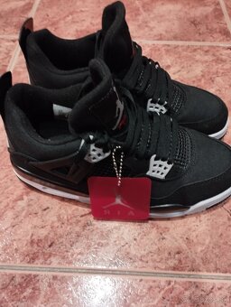 Jordan 4 Black Canvas - 2