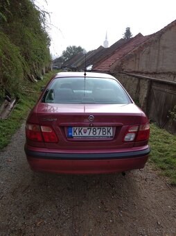 Nissan Almera 1,8 - 2