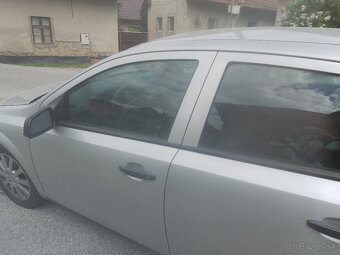 Astra twinsport 1.6 benzín 77kw - 2