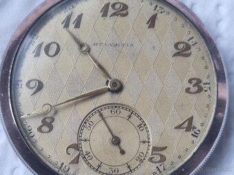 Strieborné, vreckové hodinky,Helvetia. - 2