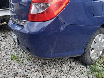 Predám zadný nárazník na Renault Thália 1.2 55kw rok2011 - 2