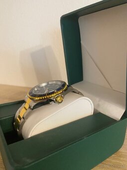 Rolex Submariner - Oystersteel, yellow gold - 2