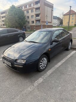 323 F 1.5 benzín - 2